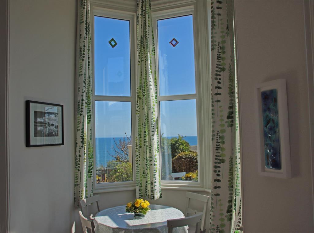 Lot: 65 - GROUND FLOOR TWO-BEDROOM FLAT CLOSE TO SEA - View through window
